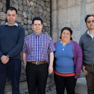 Foto de los cuatro voceros MICARE sonriendo de pie.